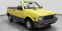 Fotostrecke: 1990 Yugo GVC Barrett-Jackson Auction