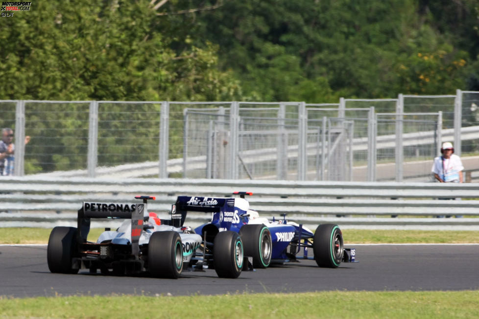 Das Ende vom Lied: Barrichello schlüpfte durch - und beschloss den Ungarn-Grand-Prix auf Position zehn vor Schumacher, der als Elfter punktelos blieb.
