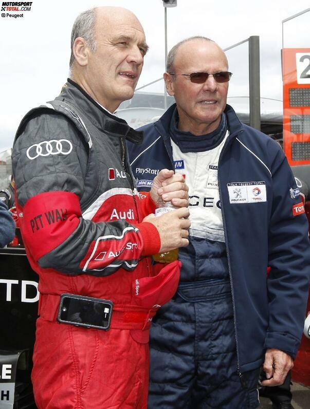 Versöhnlicher Abschluss eines emotionalen Rennens: Audi-Sportchef Wolfgang Ullrich und Peugeot-Rennleiter Olivier Quesnel.