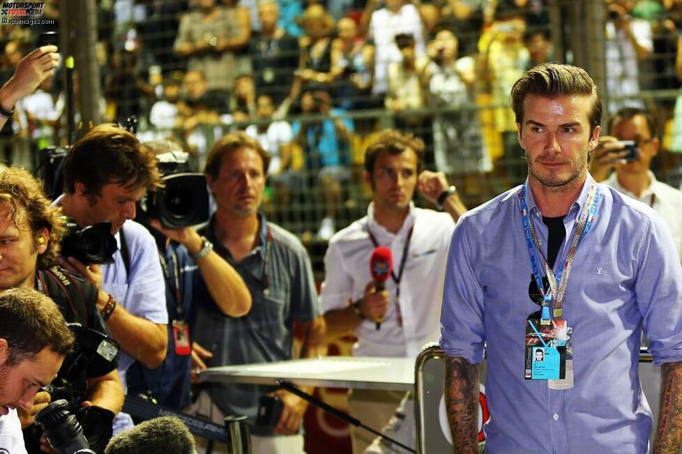 Generell scheint Singapur Monte Carlo langsam den Rang abzulaufen, was die Promi-Dichte angeht. Einer der absoluten Superstars auf dem Grid: Kicker-Schönling David Beckham.