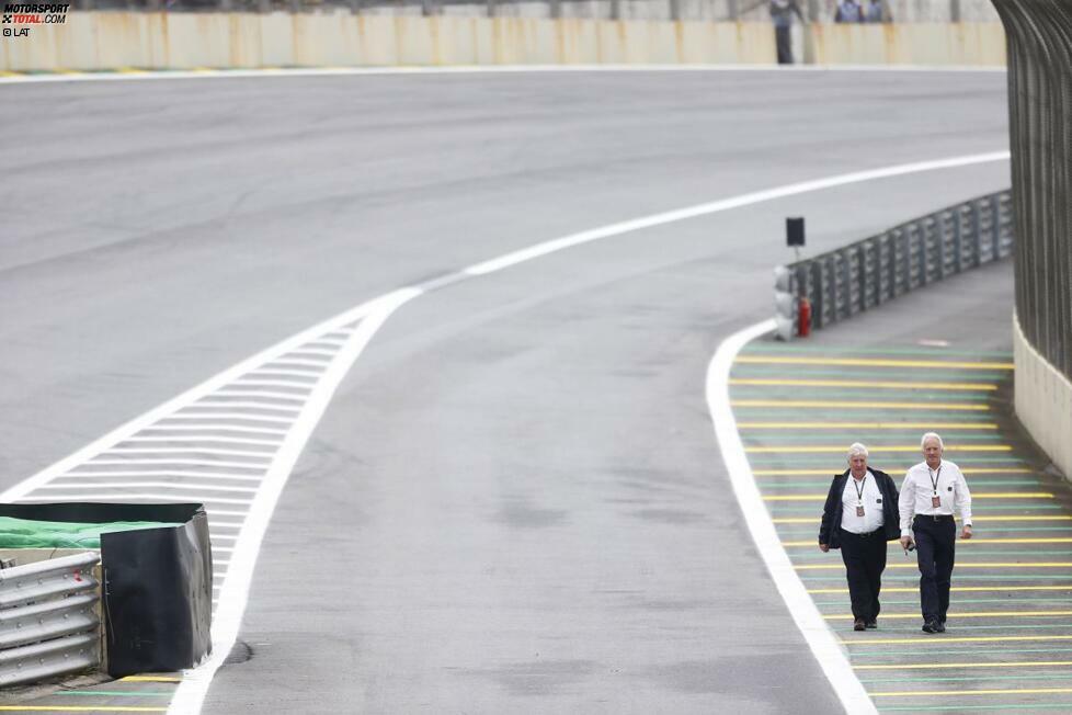 Interlagos ist nicht mehr die neueste Rennstrecke, und 2014 soll die komplette Anlage modernisiert werden. Aber solange diese beiden Herren (Herbie Blash und Charlie Whiting von der FIA) grünes Licht geben, darf noch gefahren werden. Übrigens: Die weißen Linien, an denen sie auf diesem Foto gerade langmarschieren, hätte sich Felipe Massa mal genauer anschauen sollen...