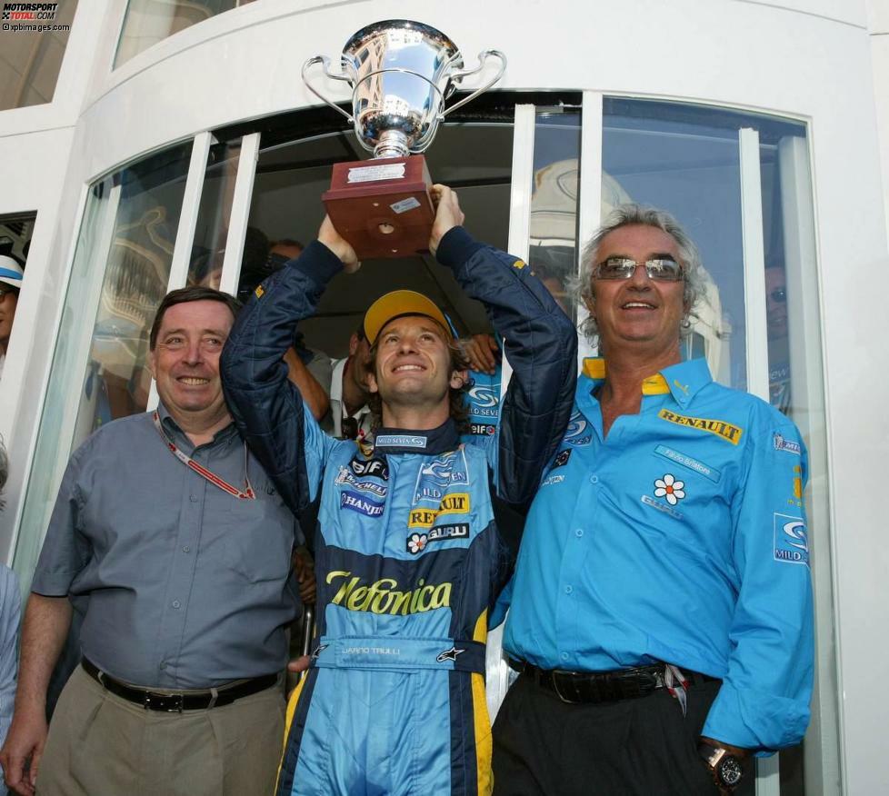2004: Das Renault-Team befindet sich auf dem aufsteigenden Ast, und Jarno Trulli gewinnt den Grand Prix - sehr zur Freude von Patrick Faure und Flavio Briatore. Michael Schumacher kann nach einer Kollision mit Juan-Pablo Montoya während der Safety-Car-Phase erstmals in dieser Saison nicht gewinnen.