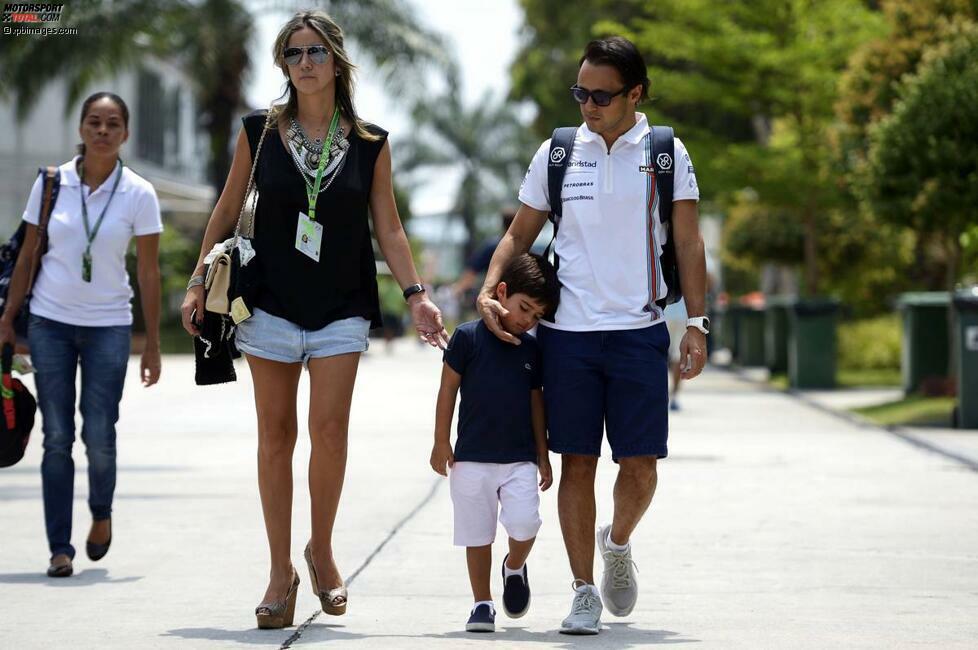 Familie Massa auf dem Weg zur Rennstrecke: Ehefrau Raffaela, Felipinho und Felipe. Es sollte ein kontroverser Renntag für den Brasilianer werden. Die Worte 
