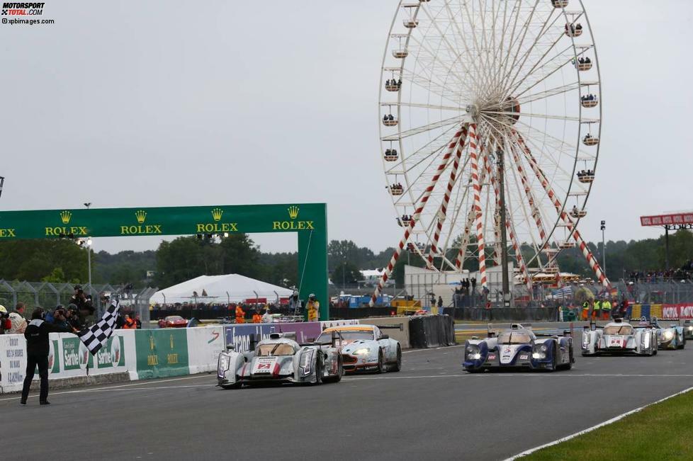 Tom Kristensen (neunter Le-Mans-Sieg!) und seine Kollegen fuhren am 23. Juni 2013 um 15:01 Uhr mit dem Audi R18 e-tron quattro Startnummer 2 als Erste über den Zielstrich.