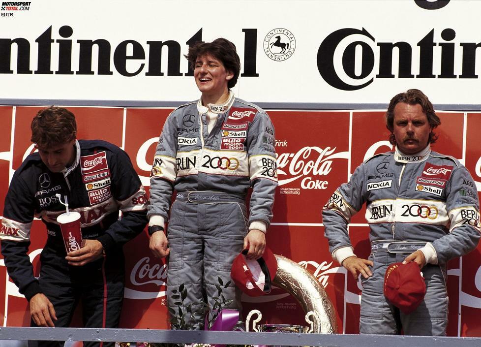 Das scheint nicht gerade jedermanns Sache zu sein. Oder wie würden Sie den Gesichtsausdruck von Keke Rosberg (rechts im Bild, links Bernd Schneider) deuten?