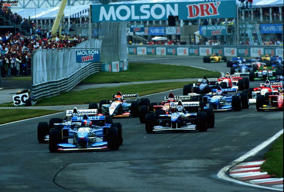 11. Juni 1995: Schumacher führt beim Grand Prix von Kanada in Montreal bis zu einem langen Boxenstopp wegen eines Lenkrad-Wechsels. Am Ende wird er Fünfter, macht aber weiteren Boden auf Hill gut, der wegen eines Getriebeschadens an dritter Stelle liegend ausscheidet. Sieger der Herzen: Alesi im Ferrari mit der legendären Startnummer 27 von Gilles Villeneuve.