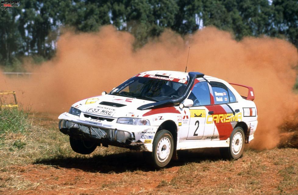 Wechsel zu Mitsubishi: 1996 & 1997 erobert Burns mehrere vierte Plätze und feiert einmal als Zweiter (Safari 97) auf dem Podest. Der Durchbruch 1998: Burns gewinnt die Safari Rallye.