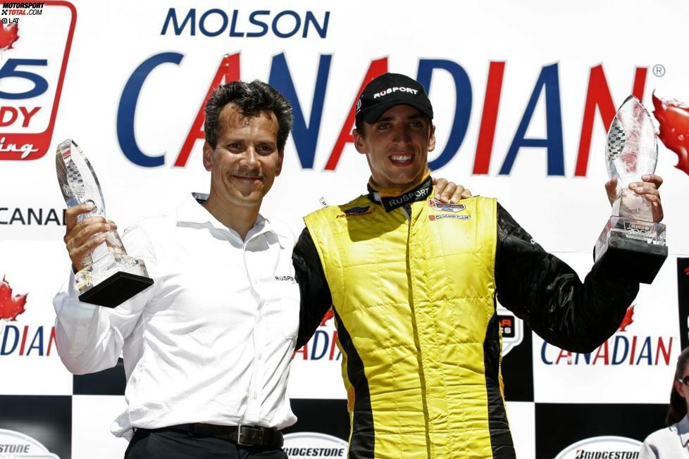 ... feiert am 10. Juli in Toronto seinen ersten Sieg. Teambesitzer Carl Russo freut sich zusammen mit dem Briten auf dem Podium.