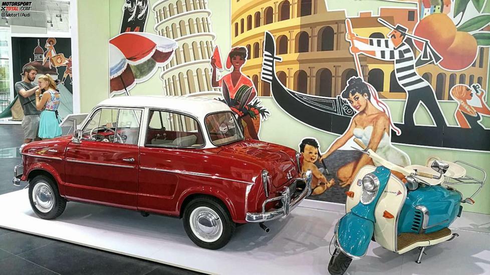 Ab Mitte der 1950er-Jahre zog es die Deutschen nach Italien. Der NSU Prinz und der NSU-Motorroller stehen für den berühmten NSU Lido in der Nähe von Venedig. Mit Hilfe des italienischen Importeurs der Marke entstand 1955 ein eigener Strand für die Werksangehörigen, Strom, Wasser und viele deutsche Produkte inklusive.