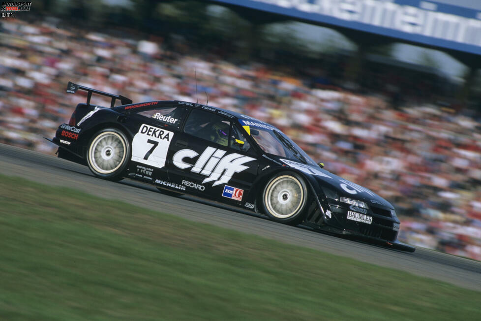 Platz 7: Der Calibra im Design von Duschgel-Hersteller Cliff wird 1996 mit Manuel Reuter am Steuer zur Legende: Der V6-Sound ist atemberaubend - und am Ende holte der Mainzer den Titel in der DTM-Nachfolgeserie ITC. Noch heute schwärmen viele Fans - auch wegen des schwarzen Designs - vom bärenstarken Cliff-Calibra.