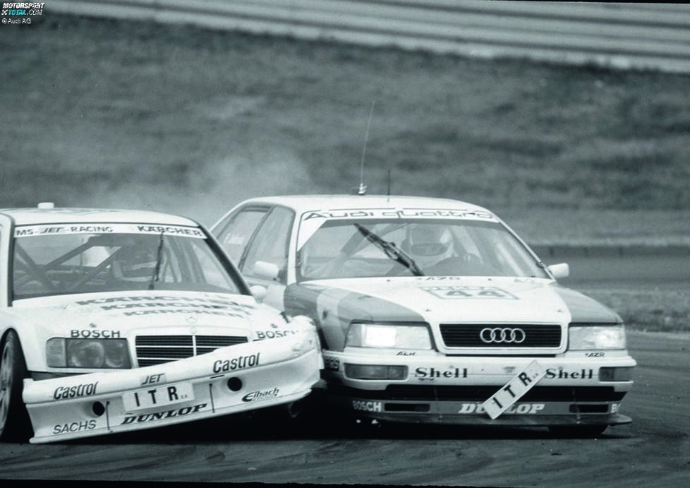 Singen 1991: Im drittletzten DTM-Rennen der Saison 1991 leistet sich Audi-Pilot Hubert Haupt ein Foul, das bis heute zu den größten DTM-Skandalen zählt. Obwohl die Teamchefs zuvor vereinbaren, sich nicht gegenseitig ins Auto zu fahren, wird Audi-Pilot Hans-Joachim Stuck von Mercedes-Fahrer Roland Asch abgeräumt, ...