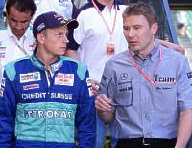 Titel-Bild zur News: Kimi Räikkönen und Mika Häkkinen