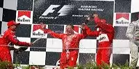 Michael Schumacher, Jean Todt und Rubens Barrichello auf dem Podium