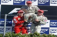 Mika Häkkinen, Michael Schumacher, David Coulthard auf dem Podium