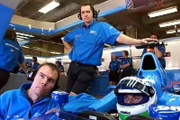 Giancarlo Fisichella in seinem B201 in der Box Titel-Bild zur News: Giancarlo Fisichella in seinem B201 in der Box