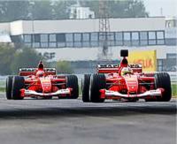 Titel-Bild zur News: Luca Badoer und Michael Schumacher