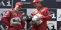 Michael Schumacher und Rubens Barrichello auf dem Podium