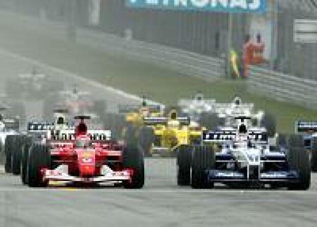 Titel-Bild zur News: Michael Schumacher, Juan-Pablo Montoya