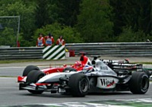 Titel-Bild zur News: Räikkönen und Schumacher