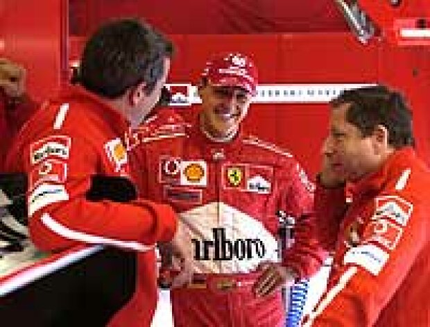 Titel-Bild zur News: Nigel Stepney, Michael Schumacher, Jean Todt (v.l.n.r.)