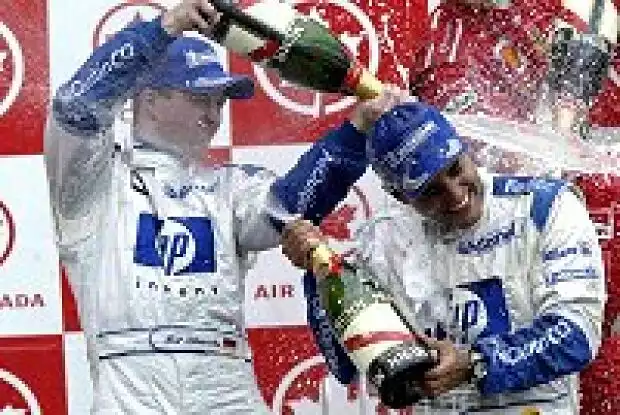 Ralf Schumacher und Juan-Pablo Montoya auf dem Podium Titel-Bild zur News: Ralf Schumacher und Juan-Pablo Montoya auf dem Podium