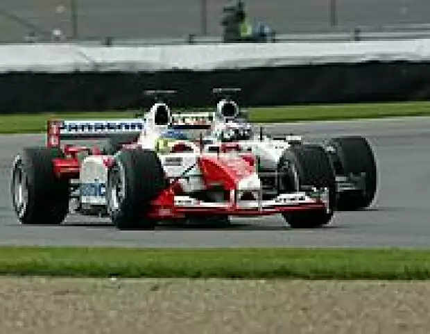 Titel-Bild zur News: Cristiano da Matta und Kimi Räikkönen
