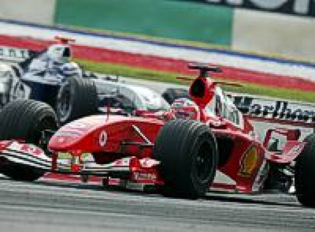 Titel-Bild zur News: Barrichello und Montoya