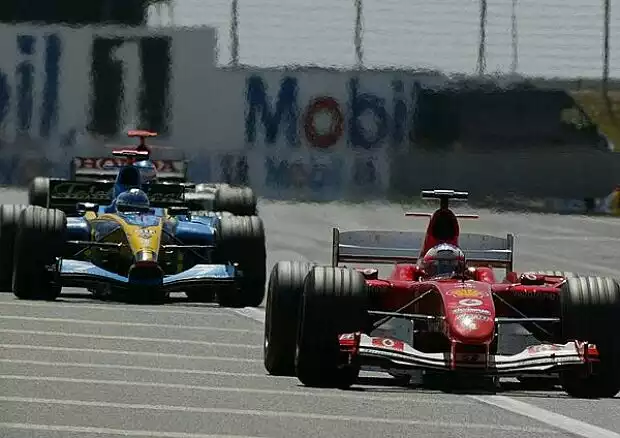 Titel-Bild zur News: Rubens Barrichello vor Jarno Trulli