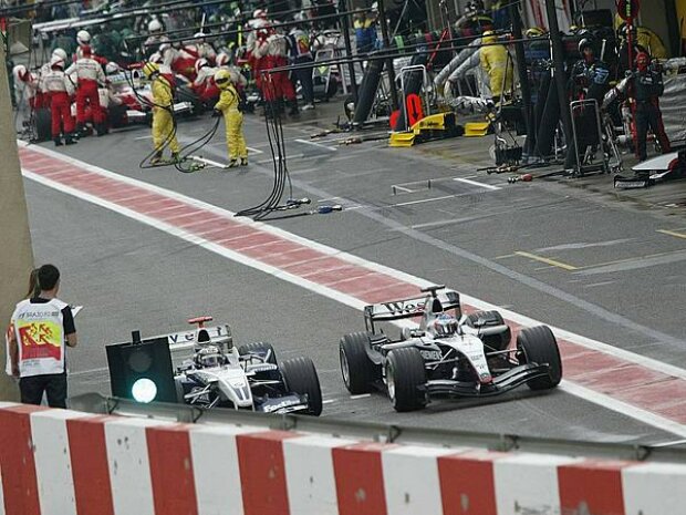 Titel-Bild zur News: Juan-Pablo Montoya und Kimi Räikkönen
