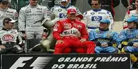 Gruppenfoto: Michael Schumacher auf Rubens Barrichello (mit Esel)