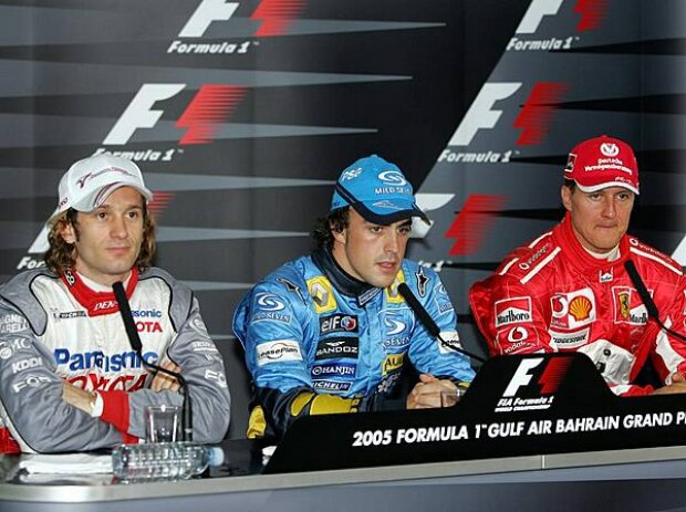 Titel-Bild zur News: Jarno Trulli, Fernando Alonso und Michael Schumacher