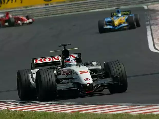 Takuma Sato vor Giancarlo Fisichella Titel-Bild zur News: Takuma Sato vor Giancarlo Fisichella