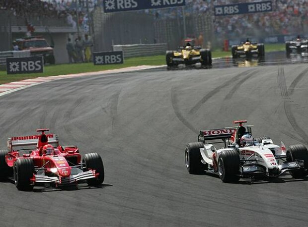 Titel-Bild zur News: Michael Schumacher und Jenson Button