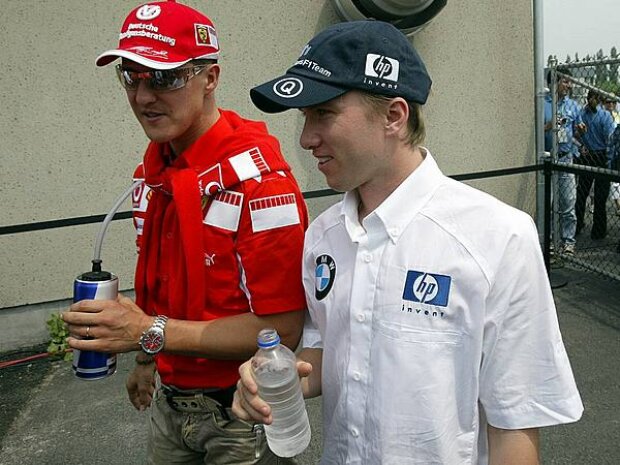 Titel-Bild zur News: Michael Schumacher und Nick Heidfeld