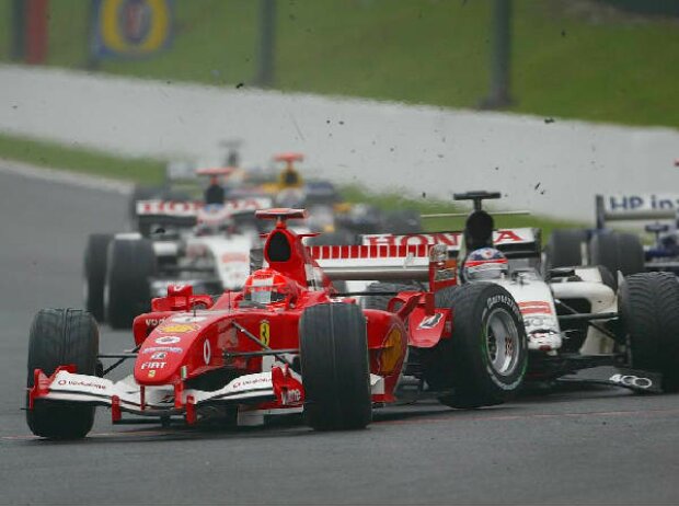 Titel-Bild zur News: Michael Schumacher und Takuma Sato