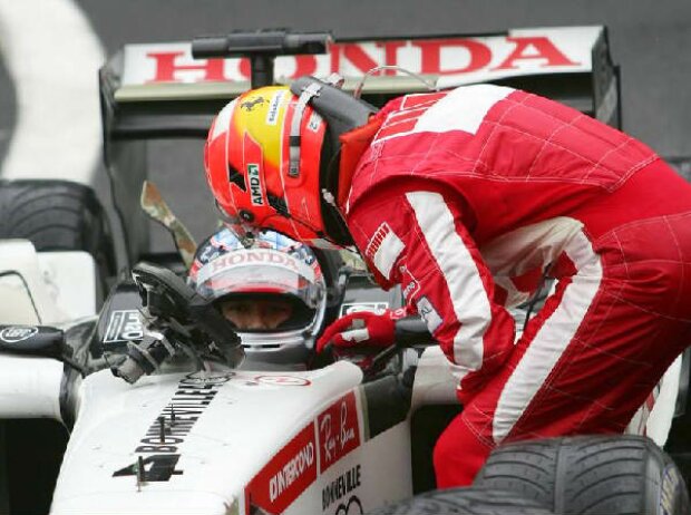 Takuma Sato und Michael Schumacher