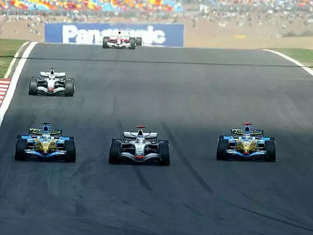 Titel-Bild zur News: Giancarlo Fisichella, Kimi Räikkönen und Fernando Alonso