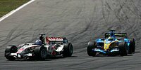 Jenson Button vor Giancarlo Fisichella