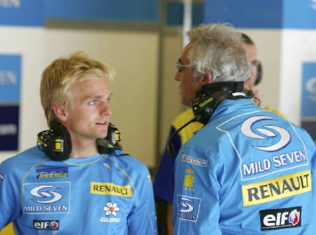 Titel-Bild zur News: Heikki Kovalainen und Flavio Briatore