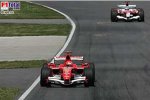 Jarno Trulli (Toyota), Michael Schumacher (Ferrari)