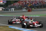Michael Schumacher (Ferrari), Ralf Schumacher (Toyota), Takuma Sato (Super Aguri F1 Team)
