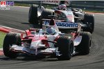Jarno Trulli (Toyota), Rubens Barrichello (Honda Racing F1 Team)