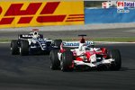 Jarno Trulli (Toyota), Mark Webber (Williams-Cosworth)