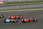 Felipe Massa (Ferrari), Michael Schumacher (Ferrari) und Fernando Alonso (Renault)