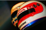 Helme von Button und Barrichello