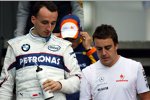 Robert Kubica (BMW Sauber F1 Team) und Fernando Alonso (McLaren-Mercedes)
