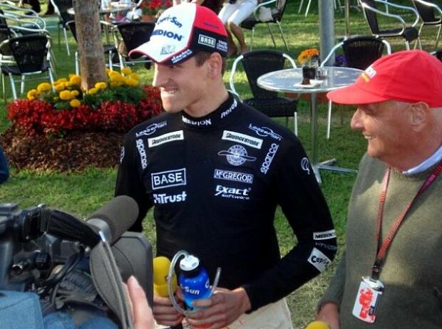 Adrian Sutil mit Niki Lauda