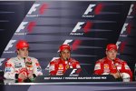 Fernando Alonso (McLaren-Mercedes), Felipe Massa und Kimi Räikkönen (Ferrari)  