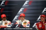 Lewis Hamilton, Fernando Alonso (McLaren-Mercedes) und Kimi Räikkönen (Ferrari) 