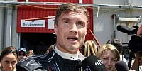 Bild zum Inhalt: Coulthard will nicht von Red Bull weg